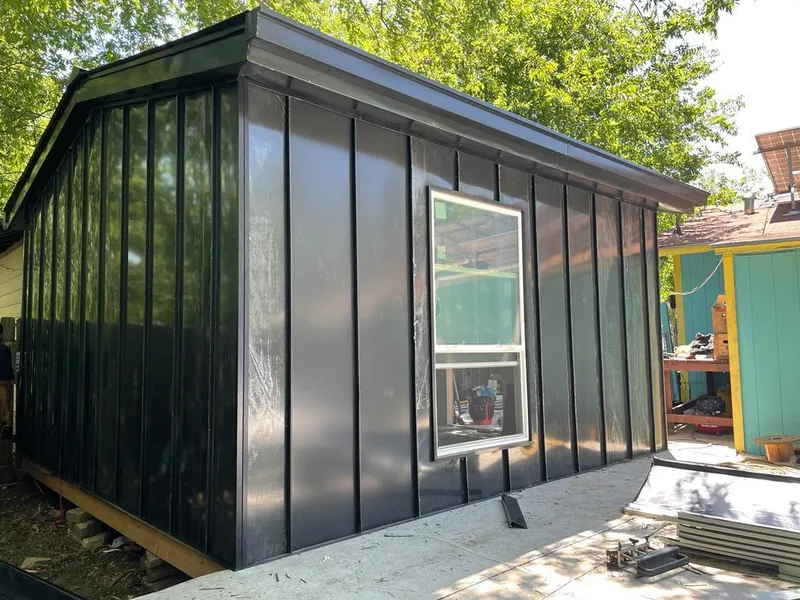 Black standing seam metal wall panels for Roof Inspection in Forest Grove