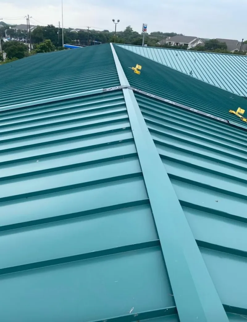 Green commercial metal roof ridge and valley for Metal Roof Repair in Forest Grove